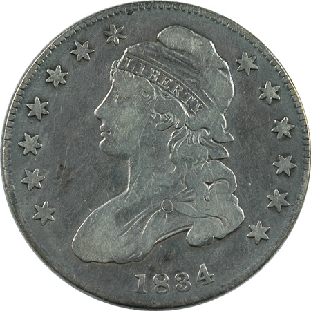 Seven Capped Bust Lettered Edge Half Dollars.