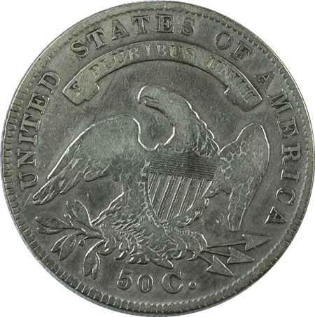 Seven Capped Bust Lettered Edge Half Dollars.