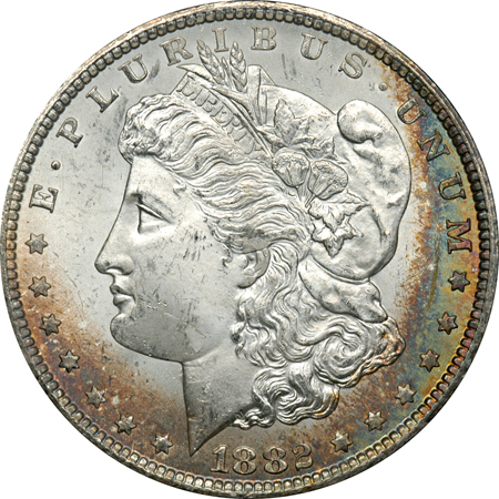 Four Toned Morgan Silver Dollars. GSA MS-63.