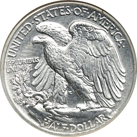 Two Walking Liberty Half Dollars.