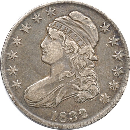 Two Capped Bust Lettered Edge Half Dollars.