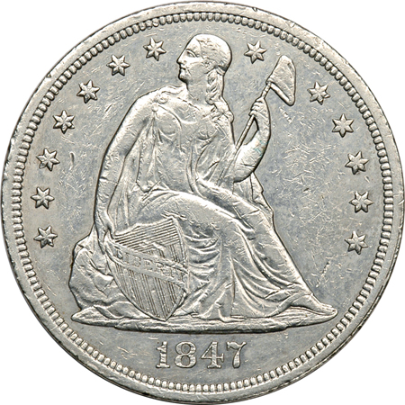 Two Seated Liberty Silver Dollars.