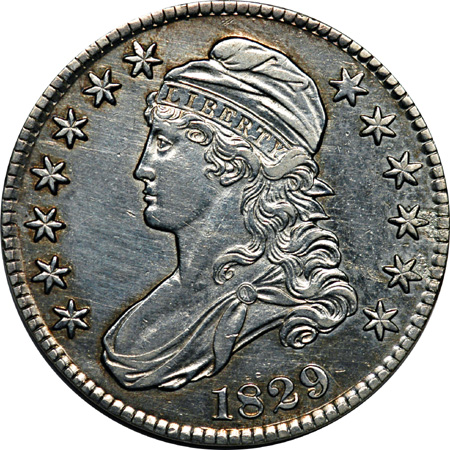 Seven Capped Bust Lettered Edge Half Dollars.