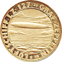 1919 British Columbia Gold Souvenir, 1928 Graf Zeppelin Gold Medal, and 1932 Manitoba Gold Souvenir.