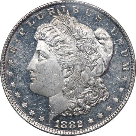 1882-S and three additional PCGS certified MS-63 'DMPL' Morgan dollars. Unc.