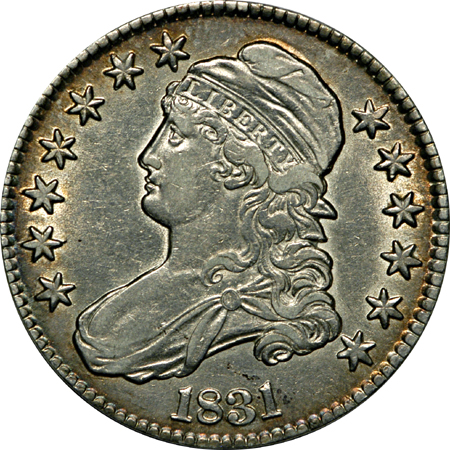 Five Capped Bust half-dollars.