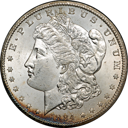 Two 1884-CC GSA Morgan dollars, NGC MS-65.