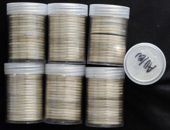 Seven AU/BU 1921 (tubes) rolls of Morgan dollars.