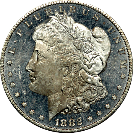 1882-CC and 1884-CC (x2) Morgan dollars.