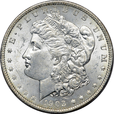 Seven 1903-O Morgan dollars.