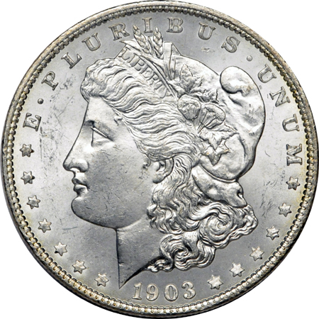 Seven 1903-O Morgan dollars.