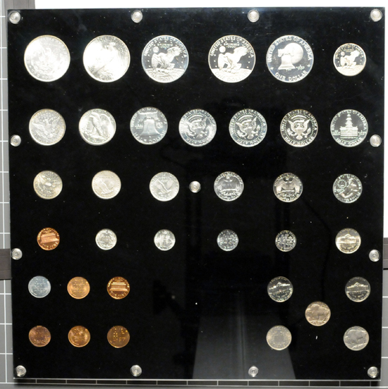 20th Century United States type coins in a Capital Plastics holder.