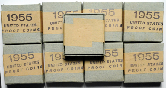 Nine unopened 1955 proof sets, in their original mint boxes.