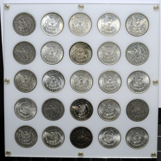 Capital Plastics board (1884 - 1890) of Morgan dollars.