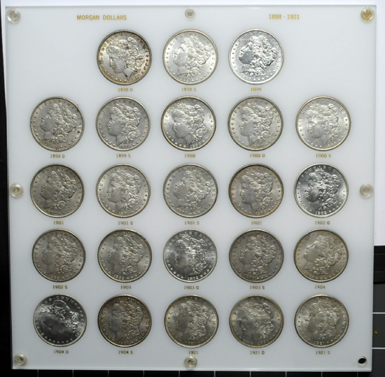 Capital Plastics board (1898 - 1921) of Morgan dollars.