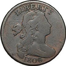 Four Large cent type coins.