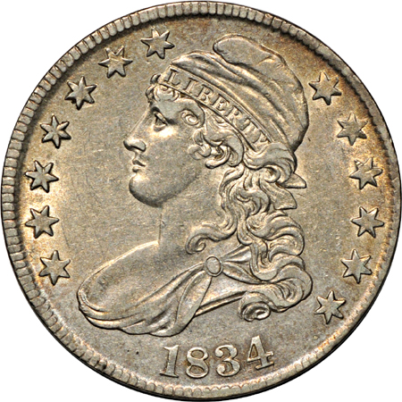 Pair of 1834 Capped Bust half-dollars.