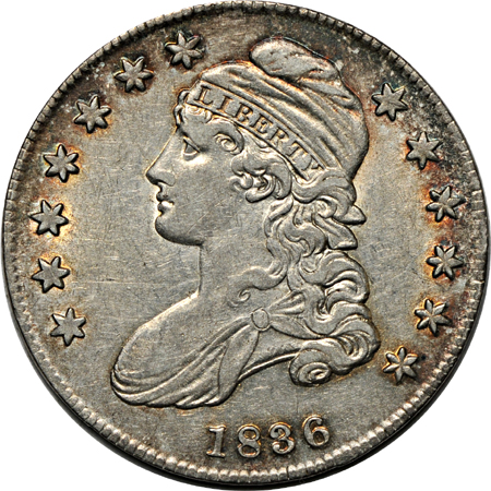 Thirteen Capped Bust half-dollars.