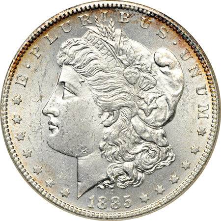 Seven certified Morgan dollars. ANACS.