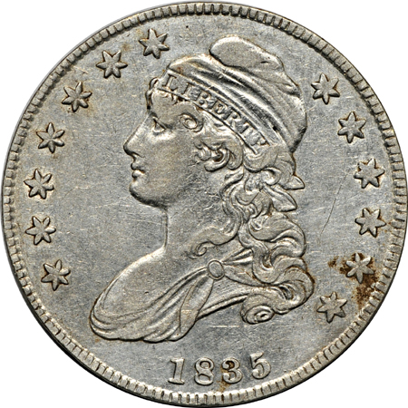 Twenty Capped Bust half-dollars.