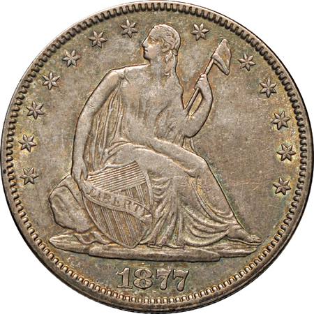 Three Seated Liberty half-dollars.