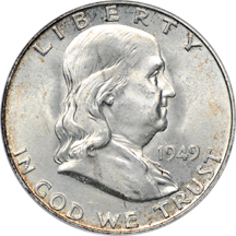 Twenty certified Franklin half-dollars. PCGS