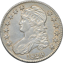 Thirteen half-dollar type coins.