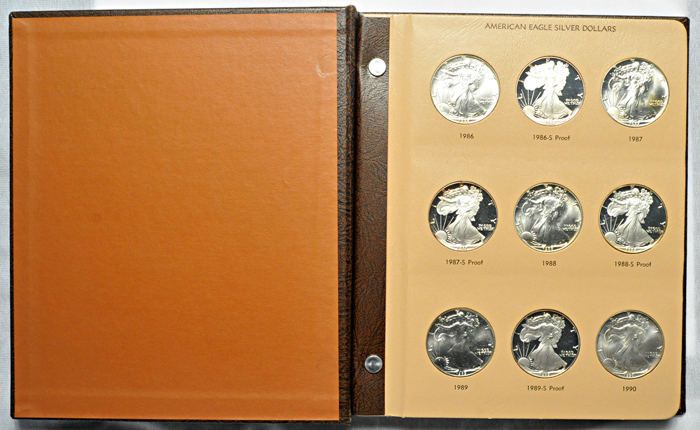 Partial album of American Silver Eagles with proofs in a Dansco 8181 album.