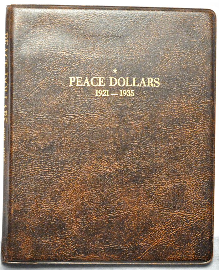 Complete set of Peace dollars in a Harco folder.