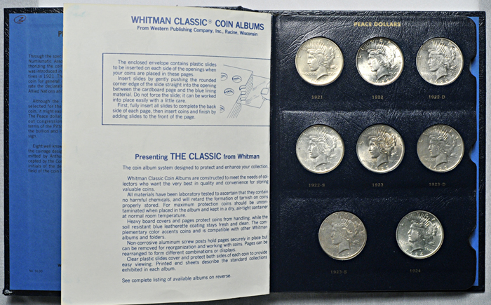 Complete set of Peace dollars in a Whitman Classic 9130 album.