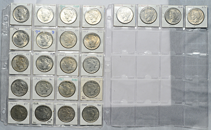 Three complete Peace dollar sets in sheets.