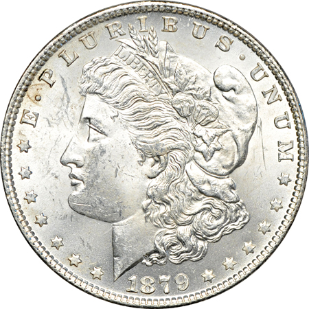 Twenty collector date/grade Morgan dollars.