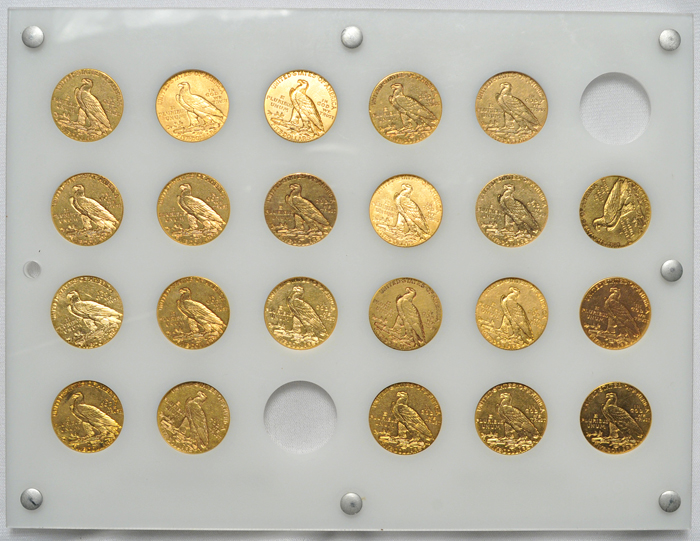 Twenty-two Indian-head half-eagles in a Capital Plastics'-like holder.