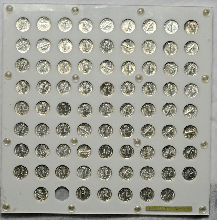 Nearly complete set of Mercury dimes (only missing 1916-D) in a Capital Plastics' holder.  AU-BU.