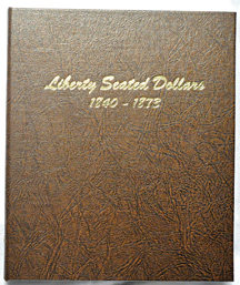 Five Seated dollars in a Dansco-like album.