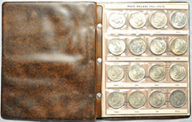 Complete set of Peace dollars in a Harco folder.