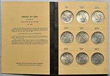 Complete set of Peace dollars in a Library of Coins album.