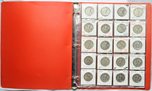 Complete set of circulated Walking Liberty half dollars in a red binder.