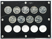 Nine 1955 thru 1963 Proof Franklin half-dollar sets in Capital Plastics' holders.