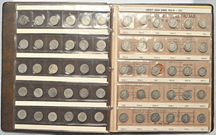 Complete set of Barber dimes in plastic sheets.