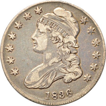 Six Capped Bust half-dollars.