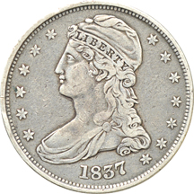 Twenty type coins 1/2 cent through 1/2 dollar, including two Silver Commemoratives and a love token.