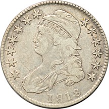 Four Capped Bust half-dollars.