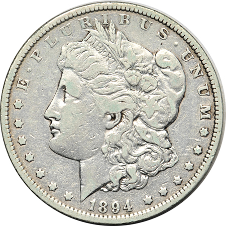 Six collector date Morgan dollars.