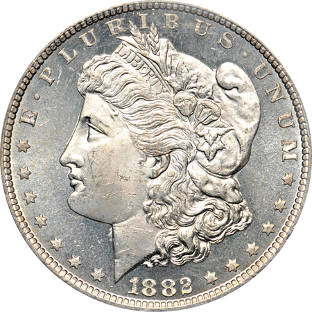 Four PCGS certified CC Morgan dollars.