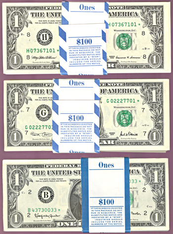 Three $100 packs of $1 star notes.  1963-A New York, 1999 St. Louis, and 2001 Chicago.