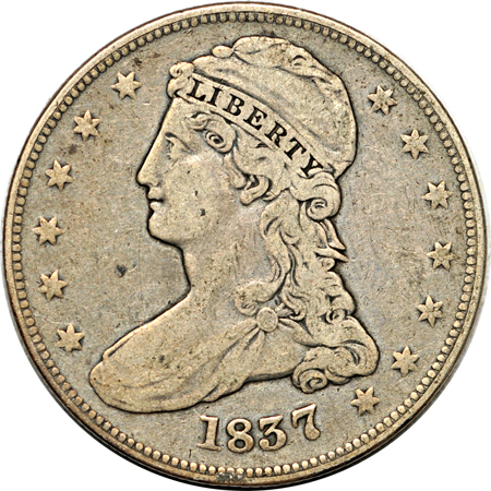 Nine Bust half-dollars, reeded edge.