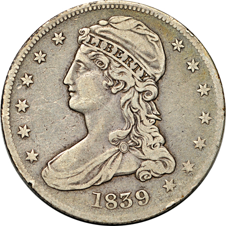 Five Capped Bust half-dollars.