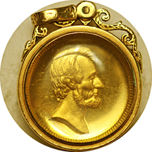 (1864 - 1866) U. S. Mint Washington and Lincoln gold medalette by Paquet (Baker-245, Julian PR-30, King-112, R.7) encased in period 14 kt. Gold bezel. MS-63 PL.