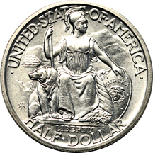 Four uncirculated silver commemorative half-dollars.